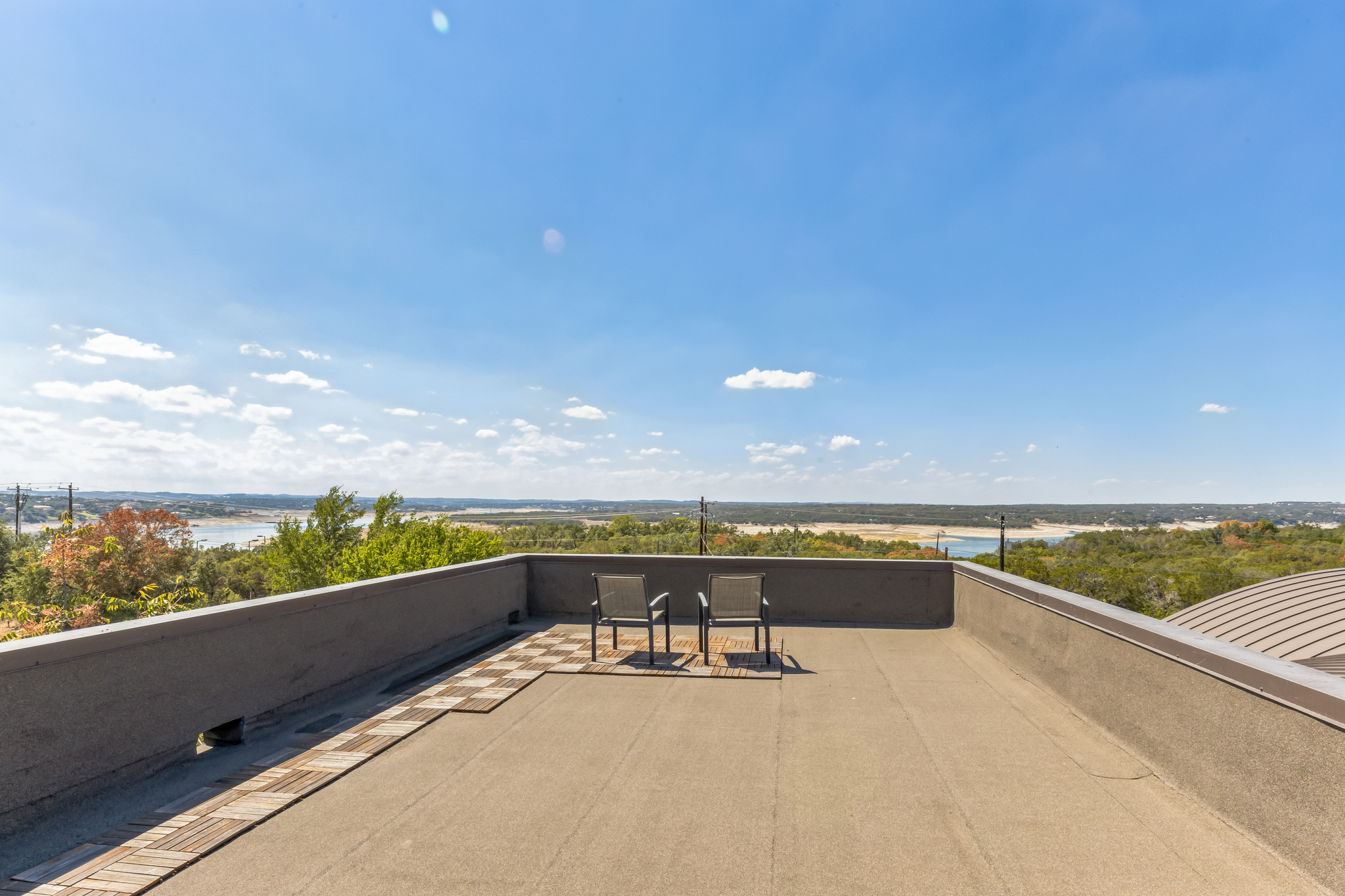4227 Eck Lane Austin, TX 78734 - Photo 26 of 30 View of patio / terrace featuring a water view