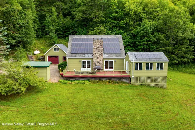 a view of a balcony with wooden fence