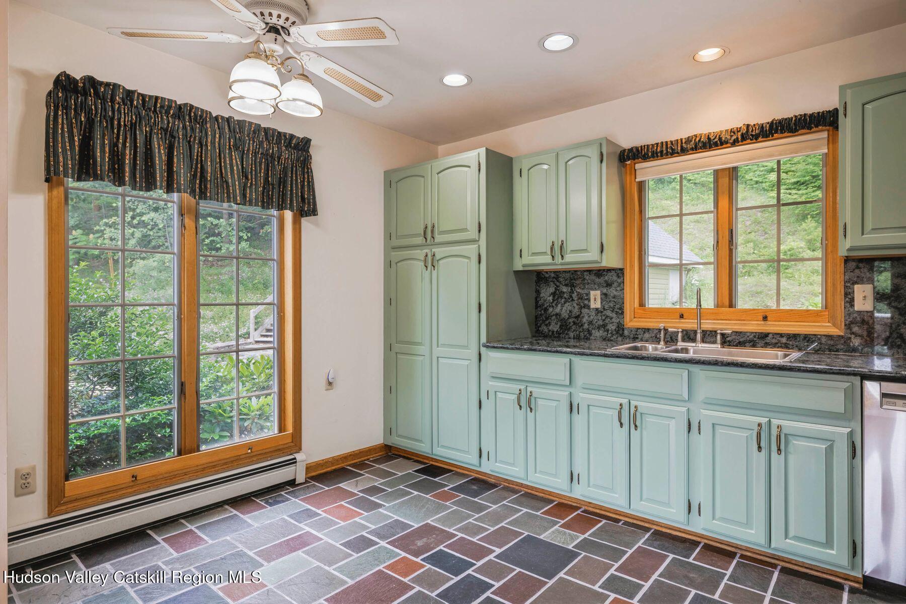 50 Halcott Ridge Road Shandaken, NY 12465 - Photo 8 of 28 a view of a kitchen with a sink and wooden floor
