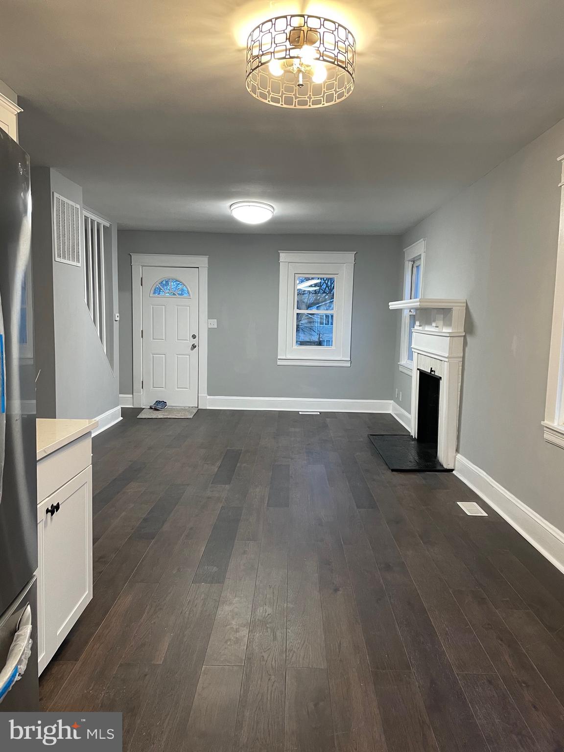 7350 Montgomery Road Elkridge, MD 21075 - Photo 18 of 44 wooden floor in an empty room with a window