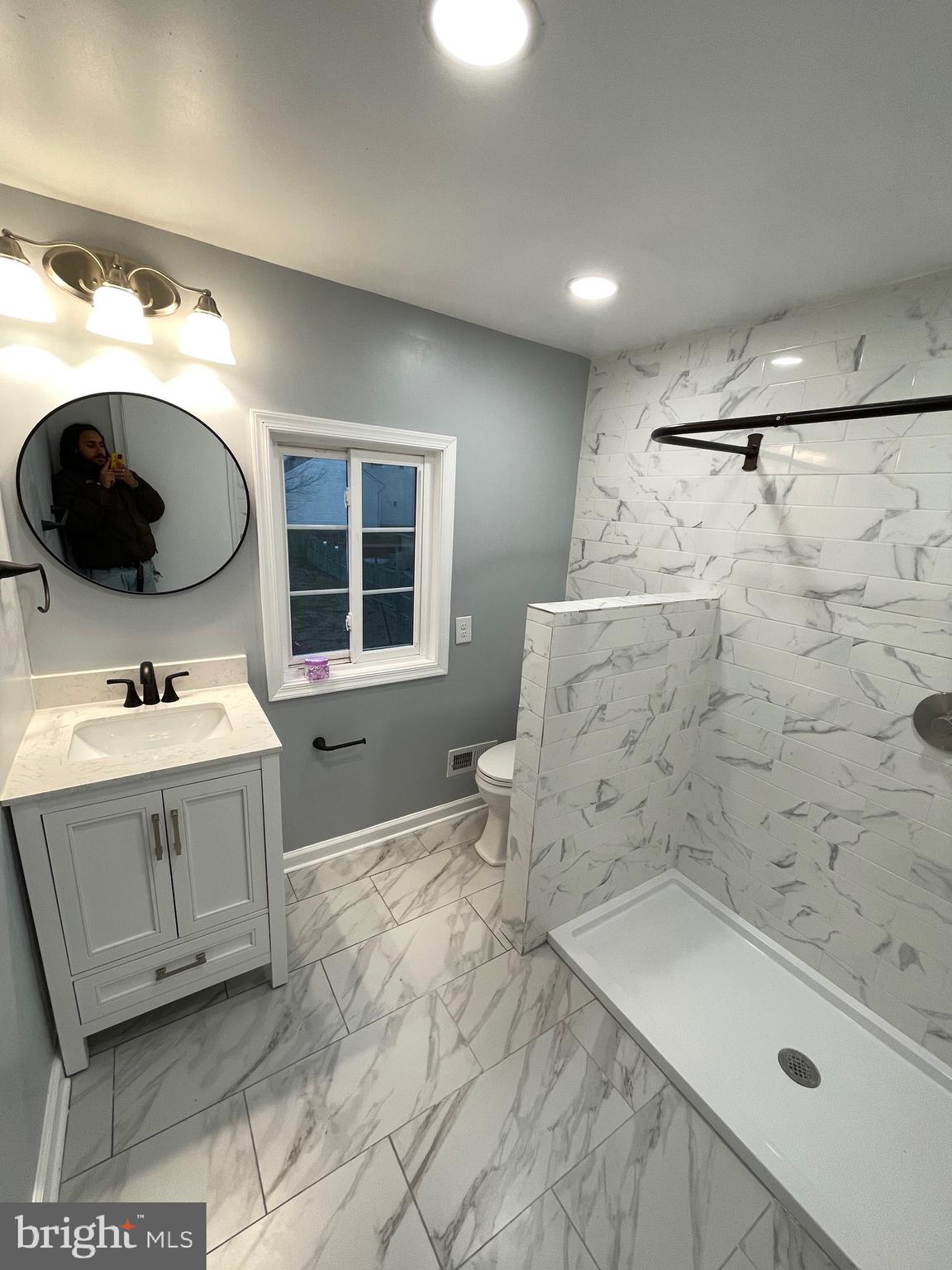 7350 Montgomery Road Elkridge, MD 21075 - Photo 8 of 44 a bathroom with a sink and a bathtub