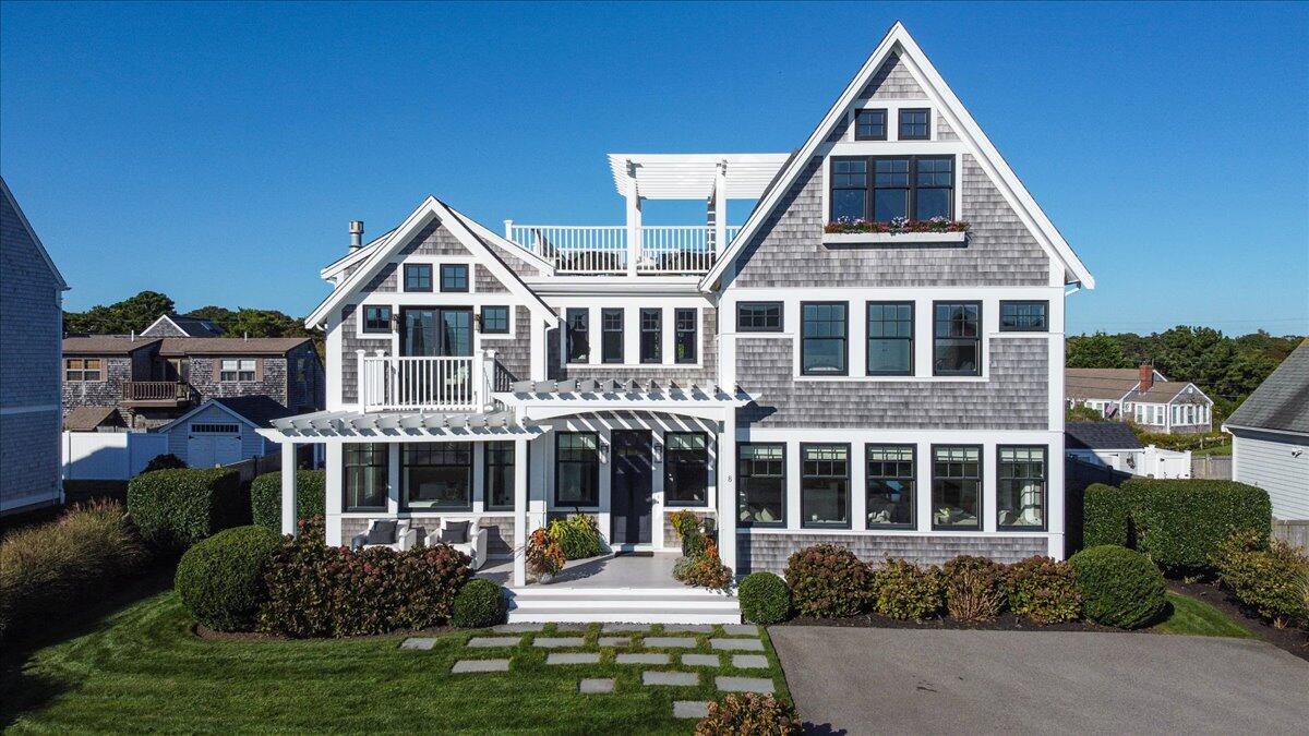8 Beach View Road West Dennis, MA 02670 - Photo 1 of 81 a front view of a house with a yard