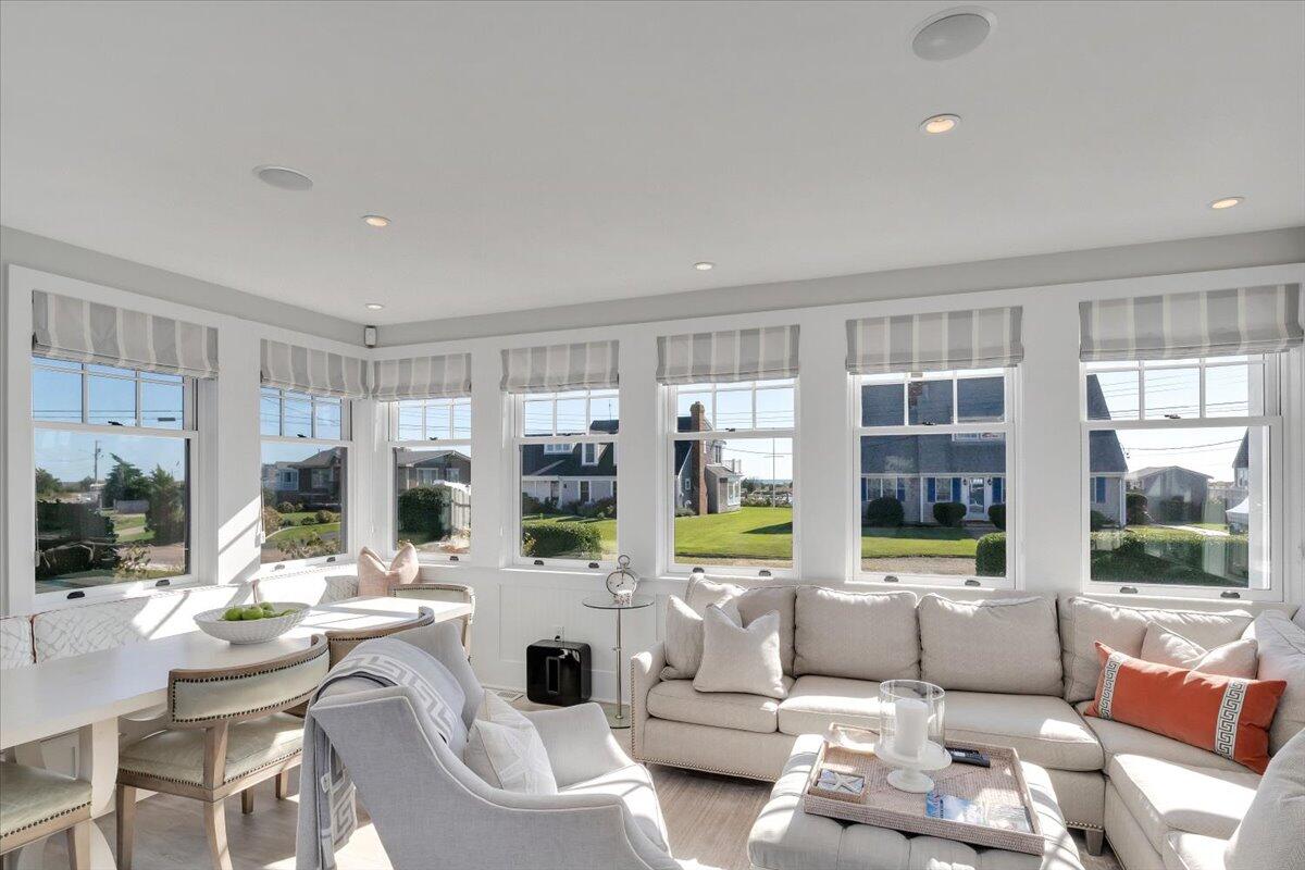 8 Beach View Road West Dennis, MA 02670 - Photo 15 of 81 a living room with furniture and a large window