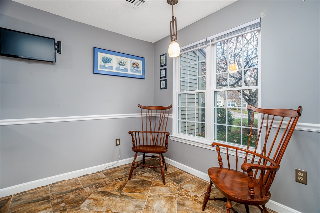 303 Ridgefield Circle, Unit C Clinton, MA 01510 - Photo 5 of 31 a workspace with furniture and a window