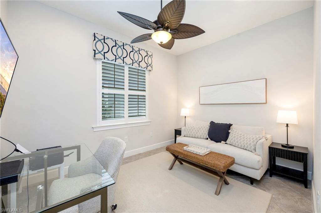 6466 Warwick Avenue Naples, FL 34113 - Photo 17 of 43 a living room with furniture and a window