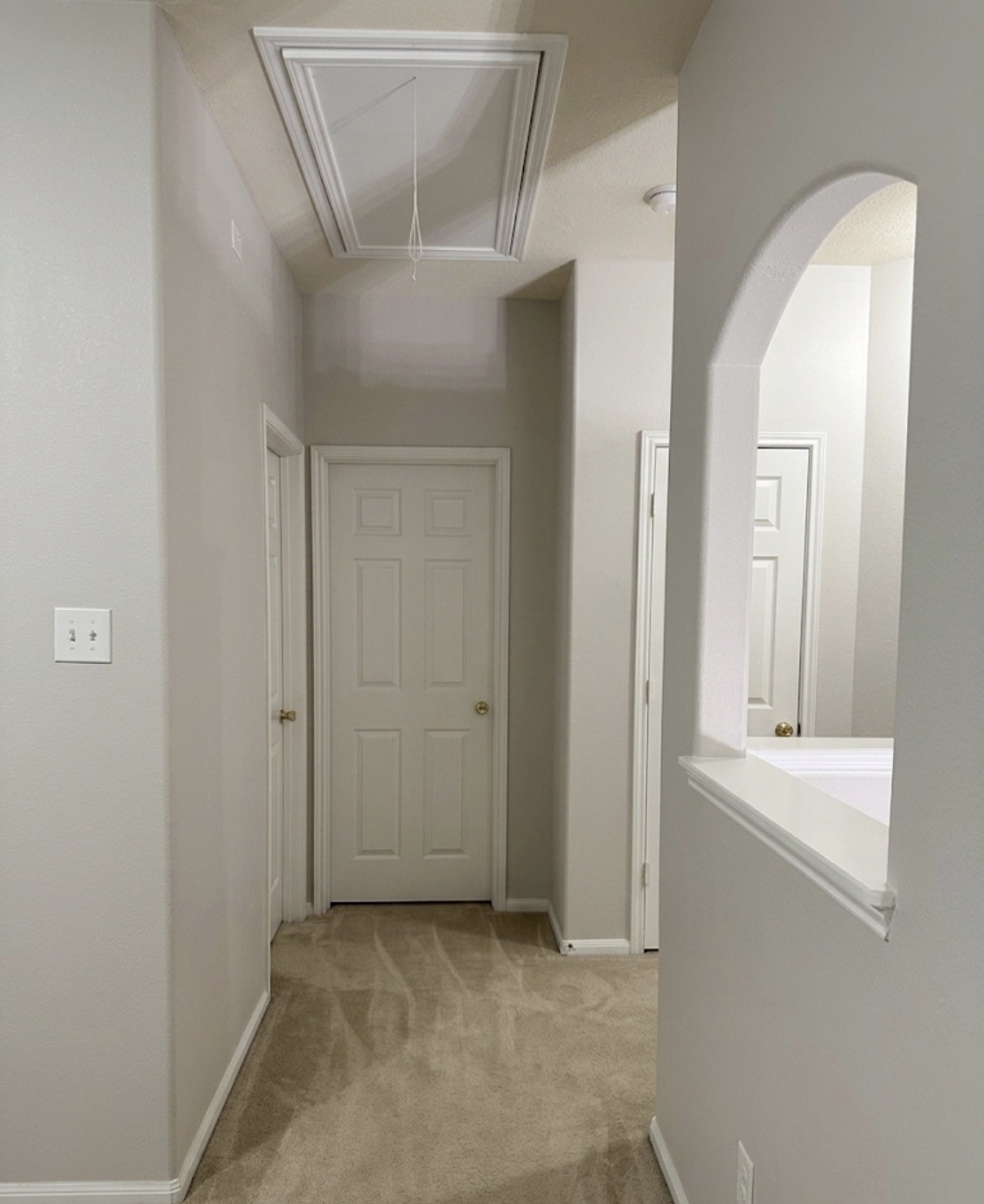 9908 Climbing Tree Street Conroe, TX 77385 - Photo 16 of 26 a view of a hallway with wooden floor
