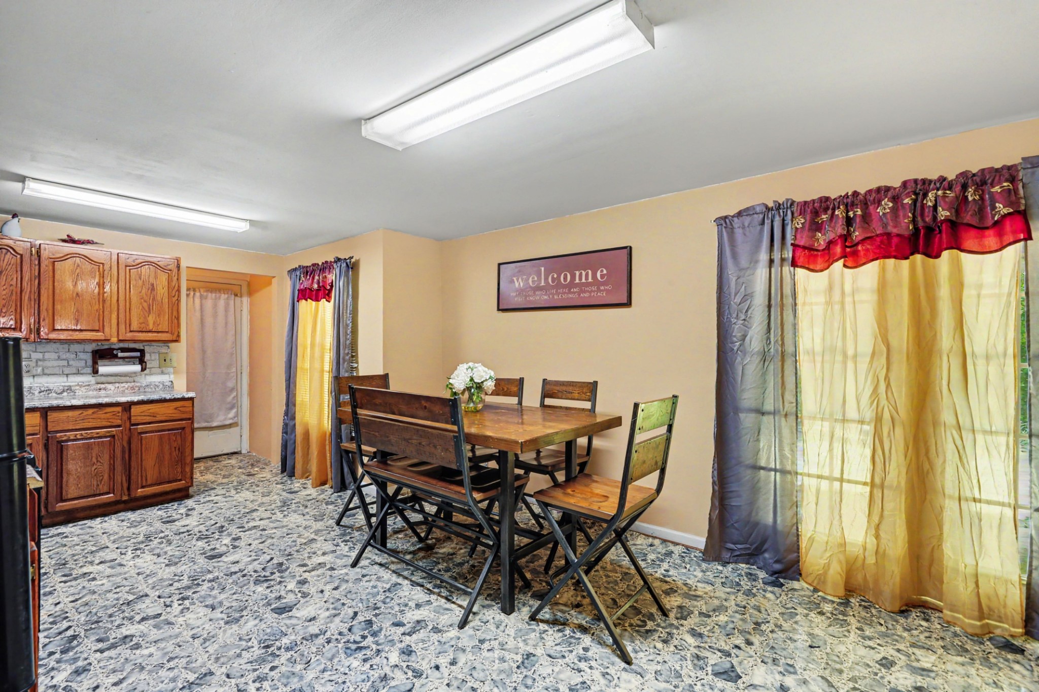 1241 Butler Bridge Road Portland, TN 37148 - Photo 7 of 15 a view of a dining room with furniture window and wooden floor