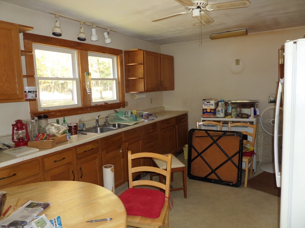 204 Ireland Street Chesterfield, MA 01084 - Photo 16 of 25 a kitchen with a sink cabinets and window