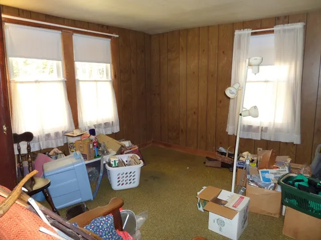 a room with furniture and a window