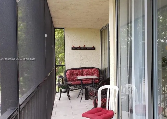a view of balcony with patio
