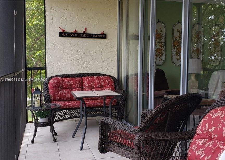 3821 Environ Boulevard, Unit 406 Lauderhill, FL 33319 - Photo 18 of 23 a view of balcony with patio
