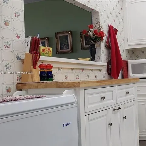 a bathroom with a shower and a toilet