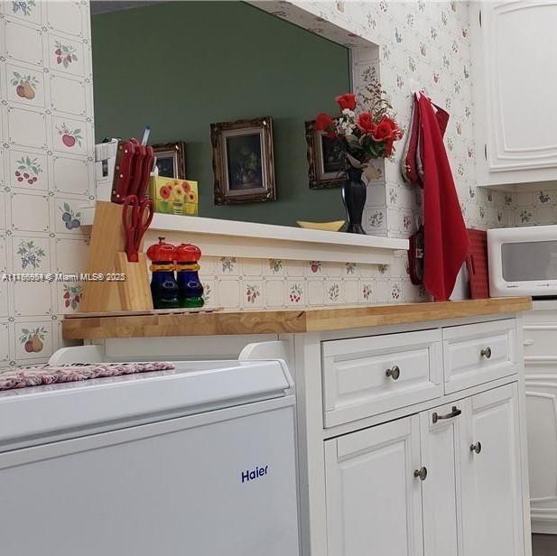 3821 Environ Boulevard, Unit 406 Lauderhill, FL 33319 - Photo 7 of 23 a bathroom with a sink and a mirror