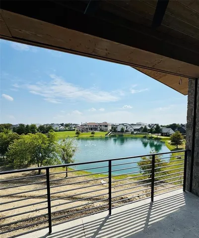 a view of a lake from a balcony