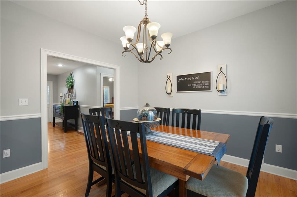 425 McDaniel Station Road Southwest Calhoun, GA 30701 - Photo 11 of 46 a view of a dining room with furniture