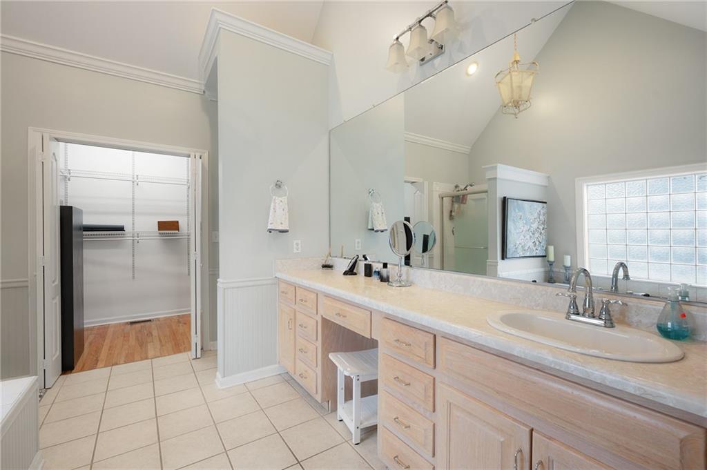 425 McDaniel Station Road Southwest Calhoun, GA 30701 - Photo 18 of 46 a bathroom with a sink and a mirror
