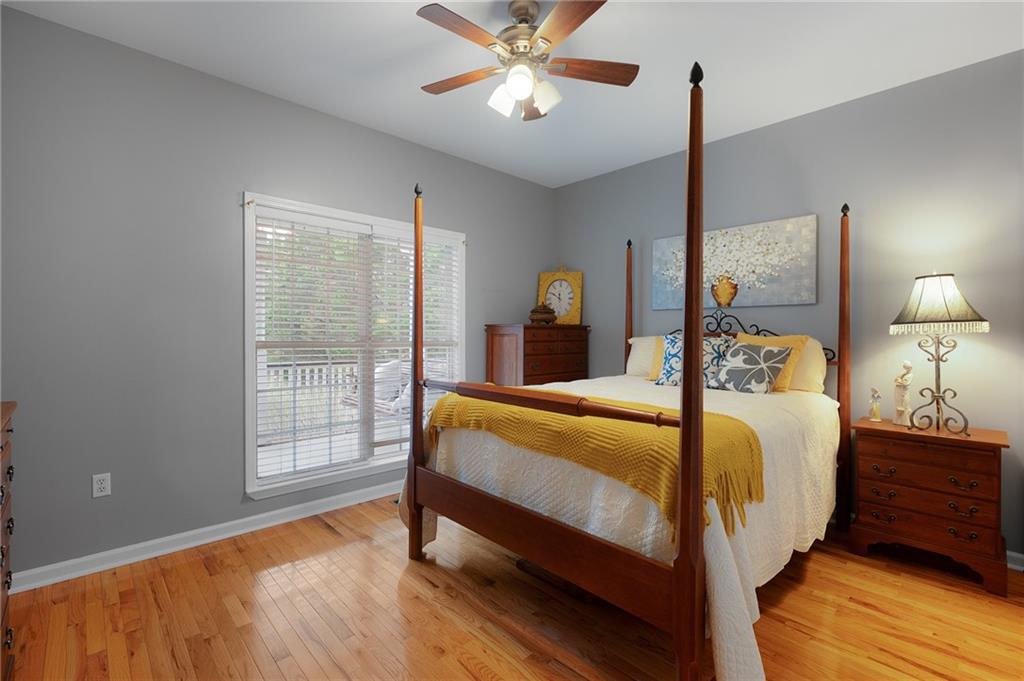 425 McDaniel Station Road Southwest Calhoun, GA 30701 - Photo 21 of 46 a bedroom with a bed and a window