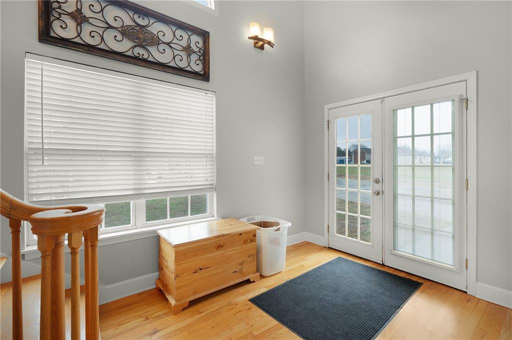 425 McDaniel Station Road Southwest Calhoun, GA 30701 - Photo 25 of 46 a bedroom with furniture and a window