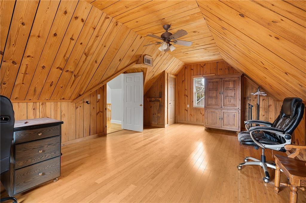 425 McDaniel Station Road Southwest Calhoun, GA 30701 - Photo 28 of 46 a view of room with furniture and wooden floor