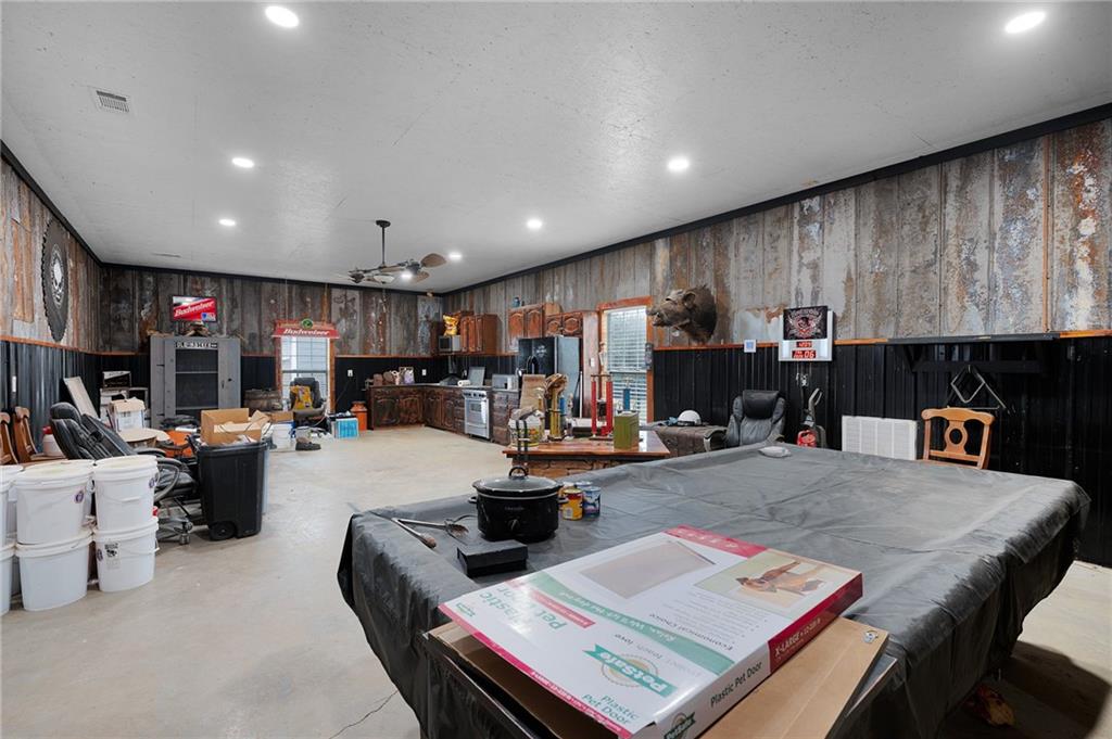 425 McDaniel Station Road Southwest Calhoun, GA 30701 - Photo 37 of 46 a living room with furniture and a fireplace