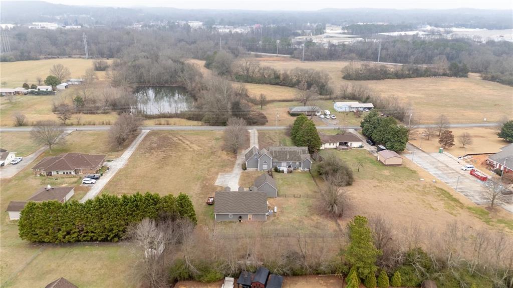 425 McDaniel Station Road Southwest Calhoun, GA 30701 - Photo 45 of 46 an aerial view of residential houses with outdoor space