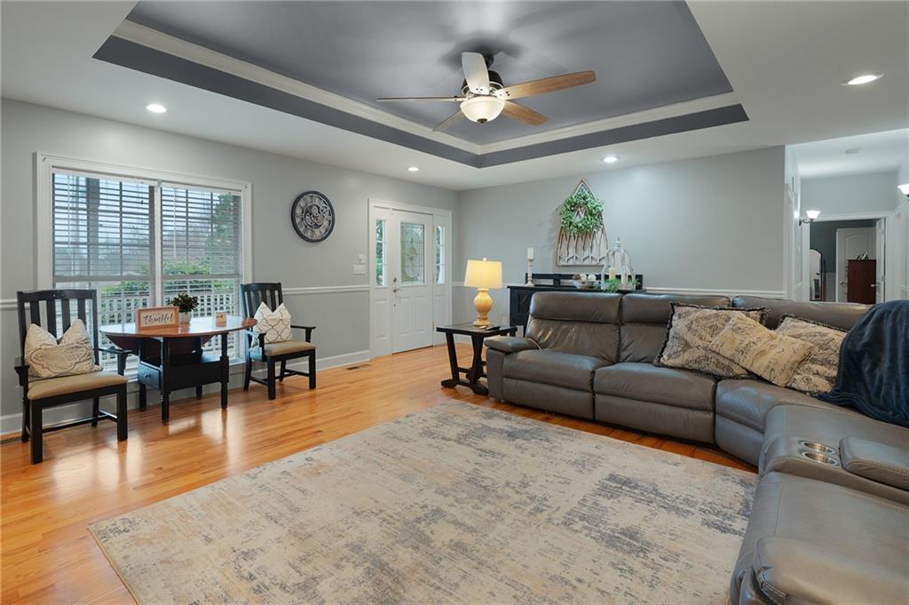 425 McDaniel Station Road Southwest Calhoun, GA 30701 - Photo 5 of 46 a living room with furniture and a large window