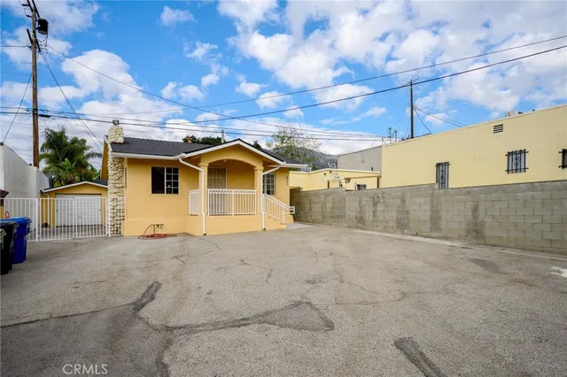 a view of a house with a park