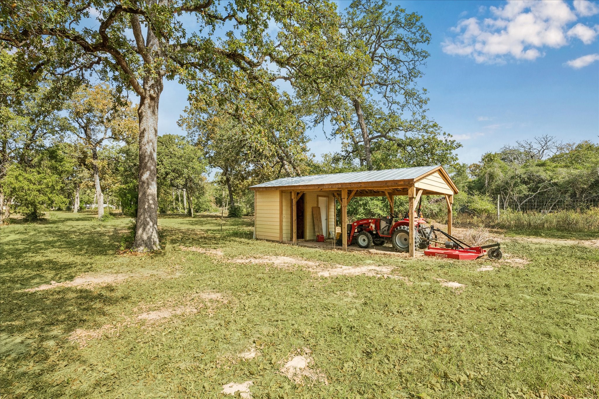 6618 Stokes Road Bellville, TX 77418 - Photo 16 of 21 a view of an house with backyard space and balcony