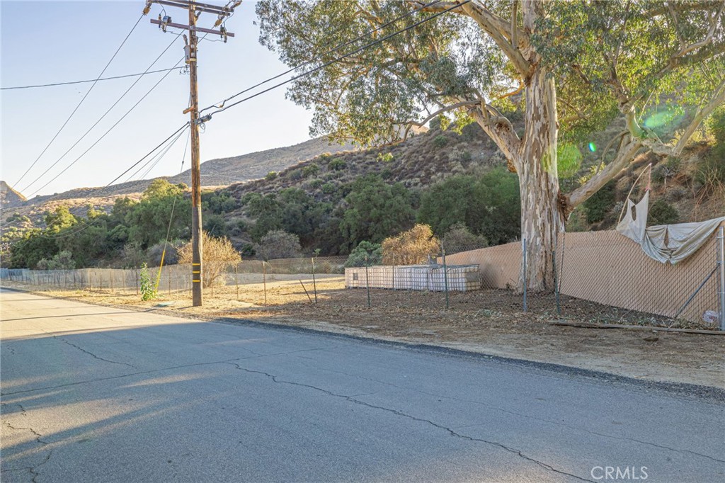 31400 San Martinez Road Castaic, CA 91384 - Photo 24 of 25 a view of a house with a yard and sitting area