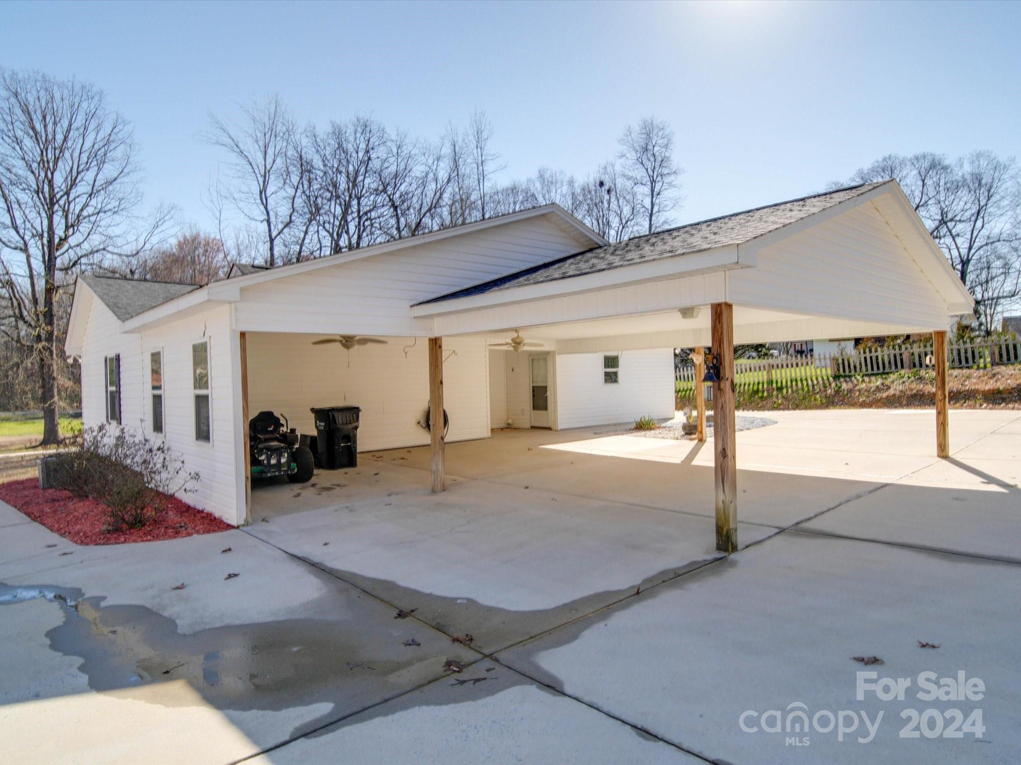 3806 Dusty Hollow Road Monroe, NC 28110 - Photo 6 of 21 a view of a house with backyard