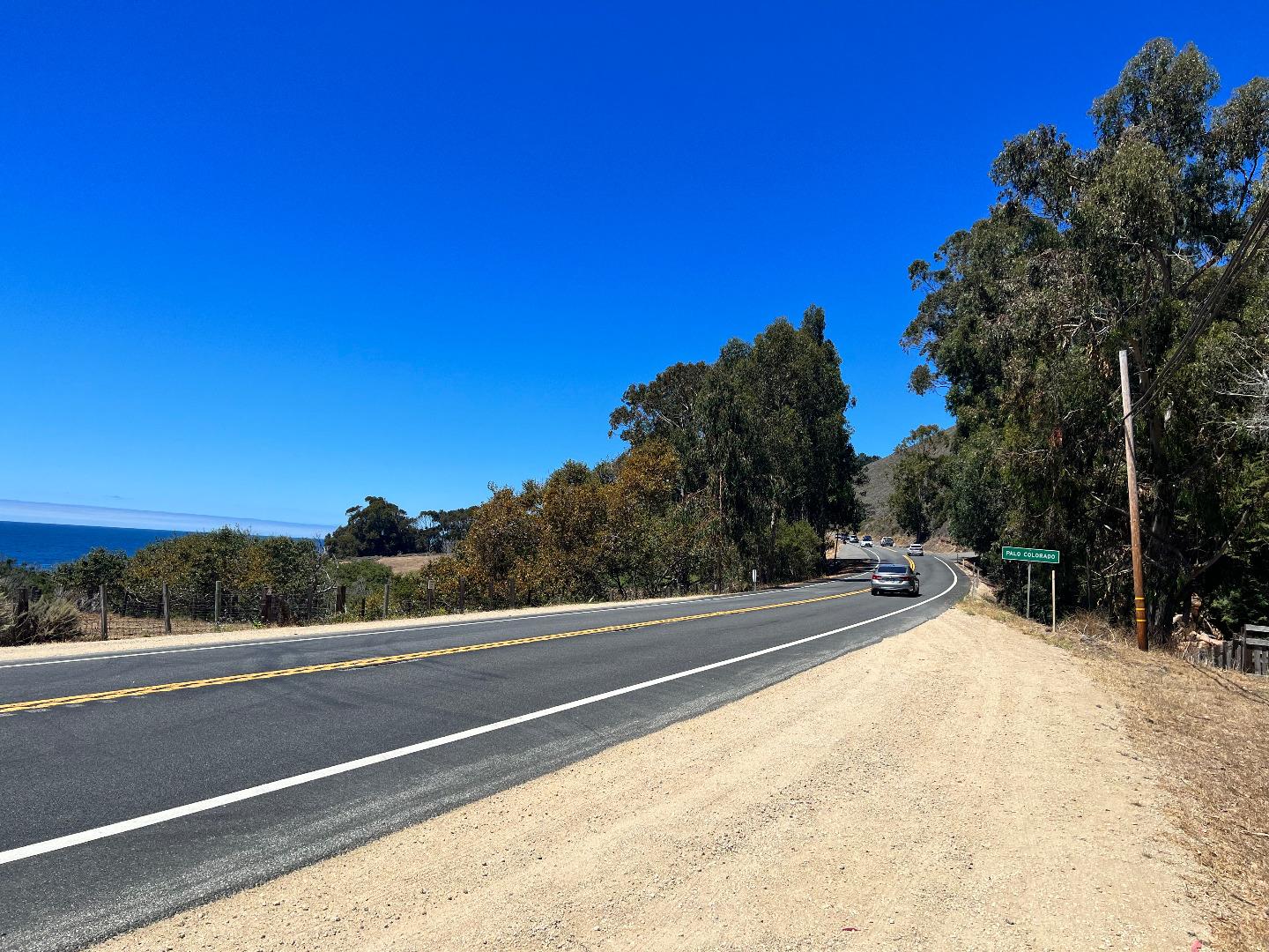 37811 Palo Colorado Road Carmel, CA 93923 - Photo 11 of 14 a view of a tennis court with trees in the background