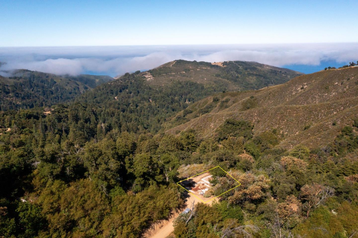 37811 Palo Colorado Road Carmel, CA 93923 - Photo 6 of 14 an aerial view of mountain with trees in the background
