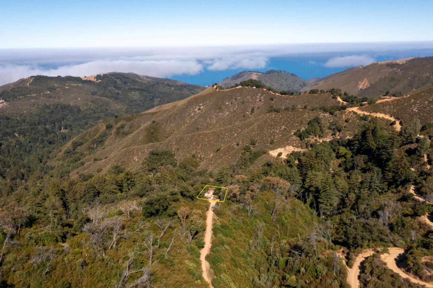 37811 Palo Colorado Road Carmel, CA 93923 - Photo 7 of 14 an aerial view of houses covered in trees