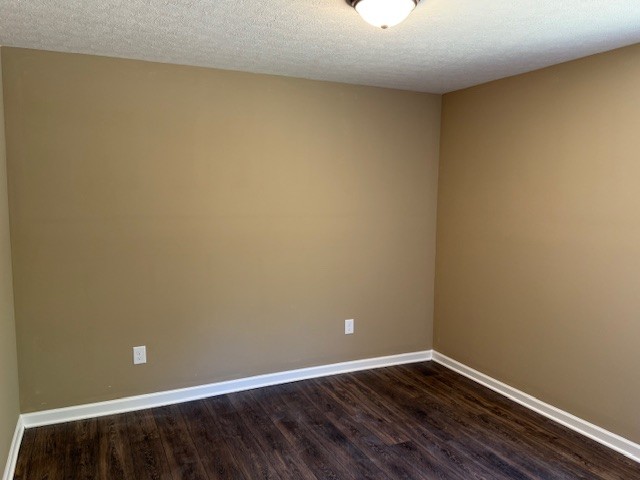 403 South High Street Tullahoma, TN 37388 - Photo 8 of 17 a view of an empty room with wooden floor