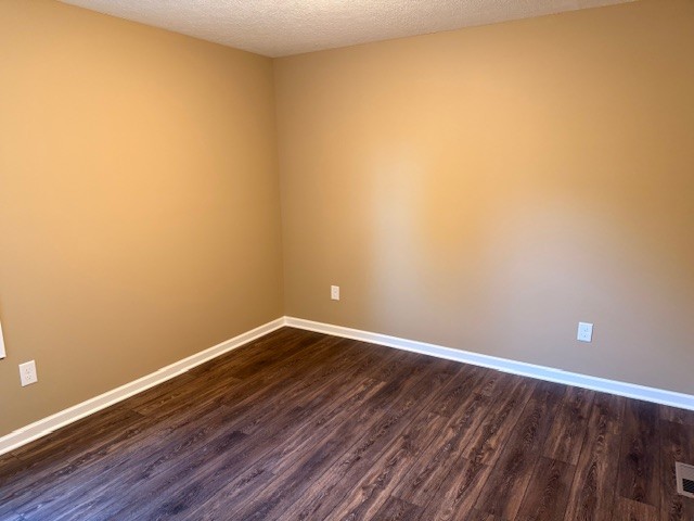 403 South High Street Tullahoma, TN 37388 - Photo 10 of 17 a view of an empty room with wooden floor