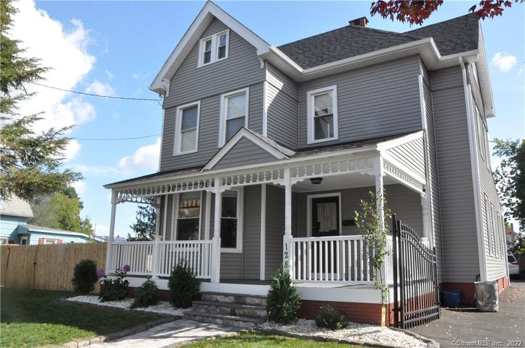 128 Spring Street, Unit 2 West Haven, CT 06516 - Photo 1 of 1 a front view of a house with a yard