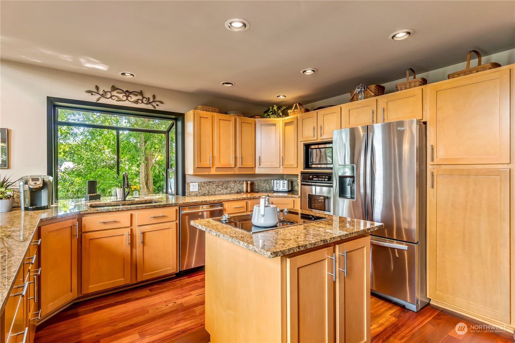 15333 West Lake Goodwin Road Stanwood, WA 98292 - Photo 12 of 39 a kitchen with stainless steel appliances granite countertop a refrigerator and a sink