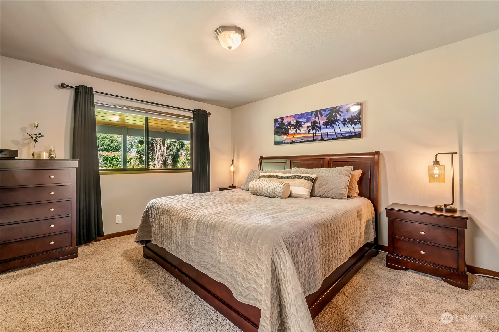 15333 West Lake Goodwin Road Stanwood, WA 98292 - Photo 15 of 39 a bedroom with a bed and a window