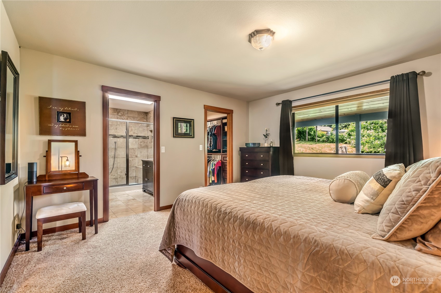 15333 West Lake Goodwin Road Stanwood, WA 98292 - Photo 16 of 39 a bedroom with a large bed and a desk