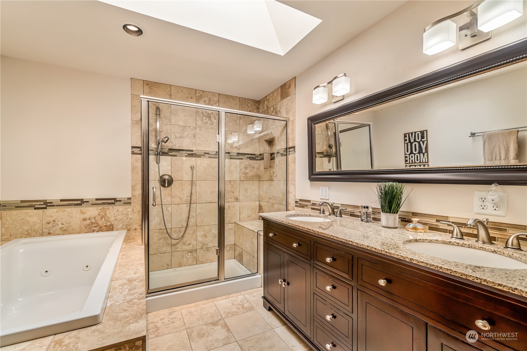 15333 West Lake Goodwin Road Stanwood, WA 98292 - Photo 17 of 39 a bathroom with a granite countertop sink mirror and bathtub