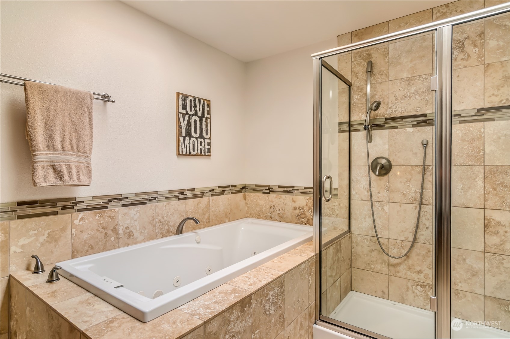 15333 West Lake Goodwin Road Stanwood, WA 98292 - Photo 18 of 39 a bathroom with a tub and a shower