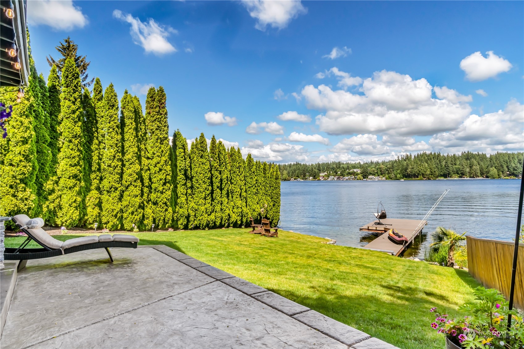 15333 West Lake Goodwin Road Stanwood, WA 98292 - Photo 27 of 39 a view of a lake with a sitting space