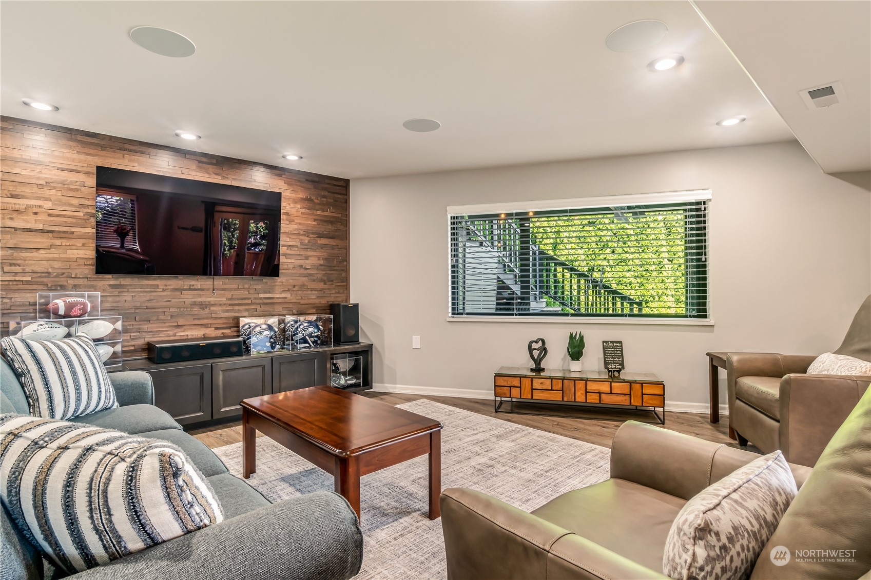15333 West Lake Goodwin Road Stanwood, WA 98292 - Photo 32 of 39 a living room with furniture and a flat screen tv