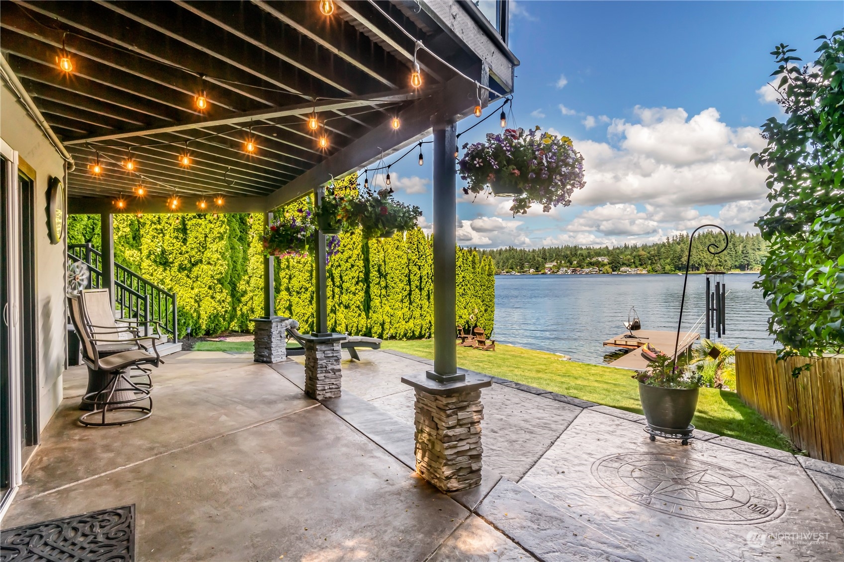 15333 West Lake Goodwin Road Stanwood, WA 98292 - Photo 33 of 39 a view of a patio with a table and chairs