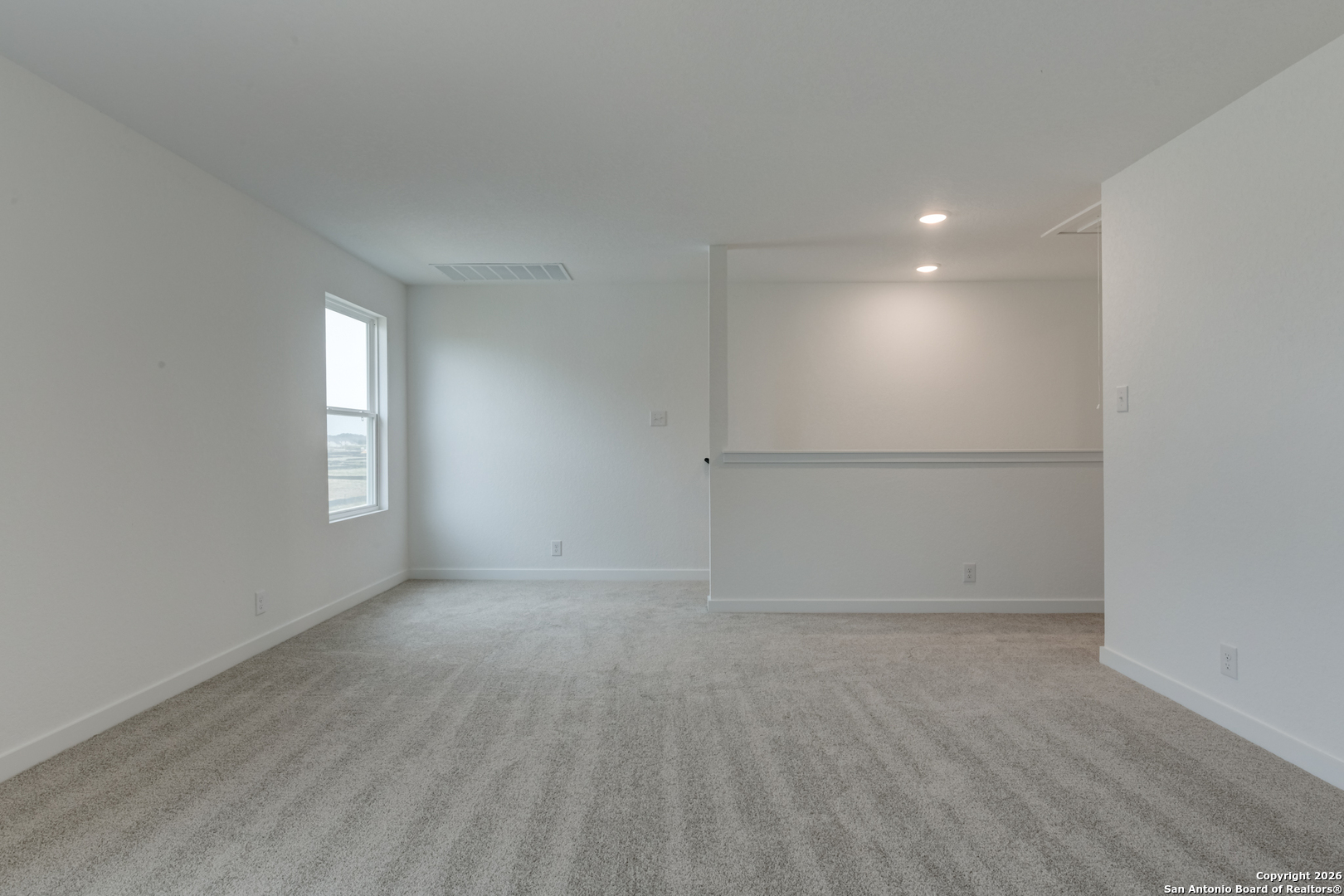 12848 Red Apple Road Schertz, TX 78154 - Photo 24 of 37 a view of an empty room and window