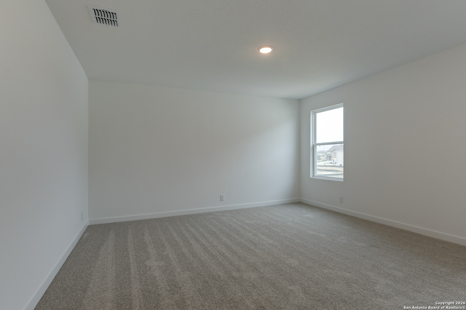 12848 Red Apple Road Schertz, TX 78154 - Photo 26 of 37 an empty room with a window