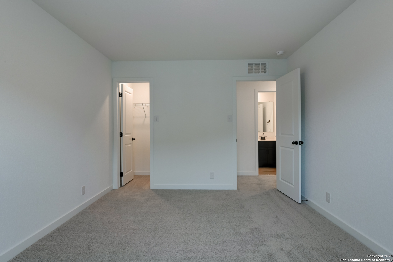 12848 Red Apple Road Schertz, TX 78154 - Photo 27 of 37 an empty room with closet area