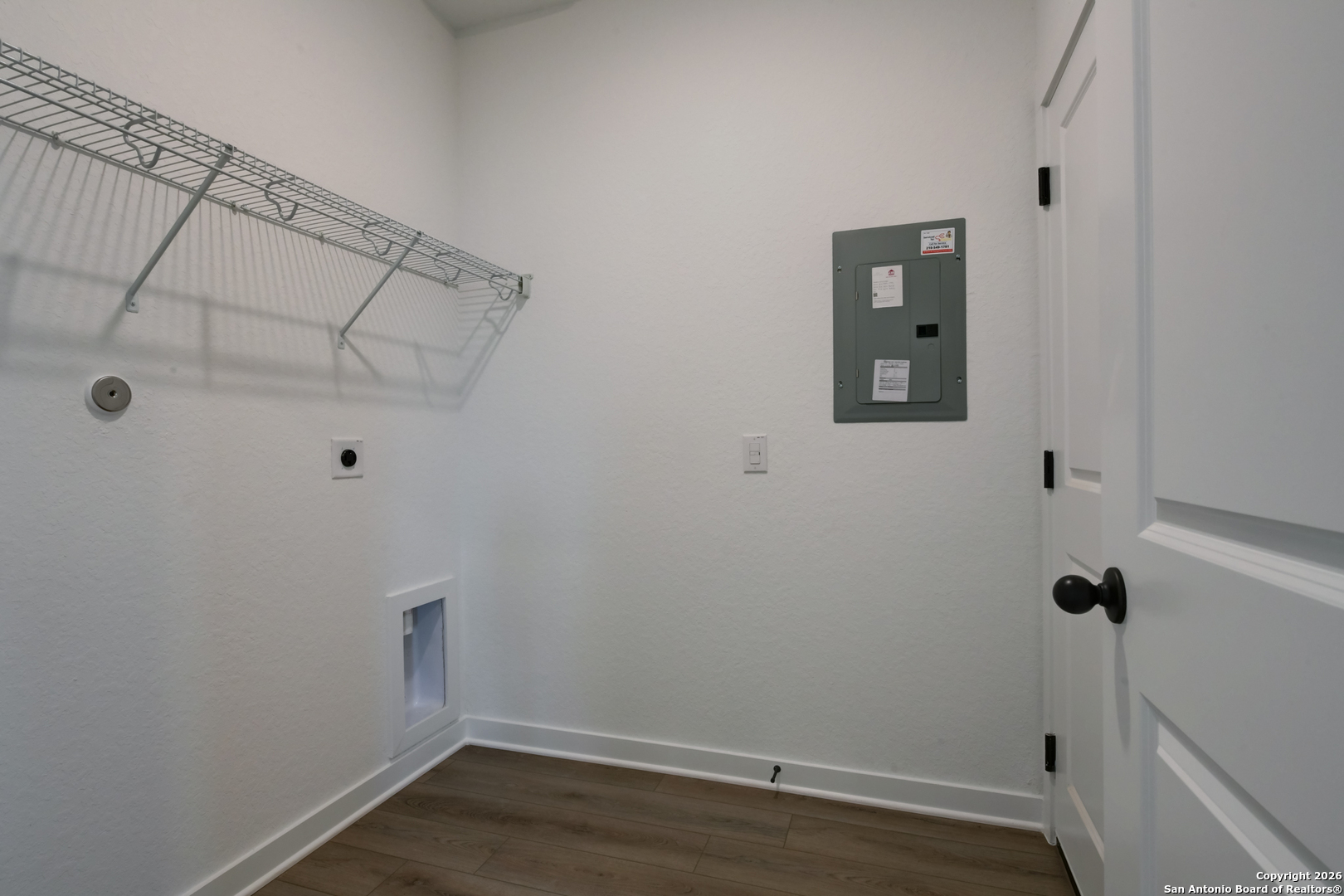 12848 Red Apple Road Schertz, TX 78154 - Photo 34 of 37 a view of a room with racks on the wall