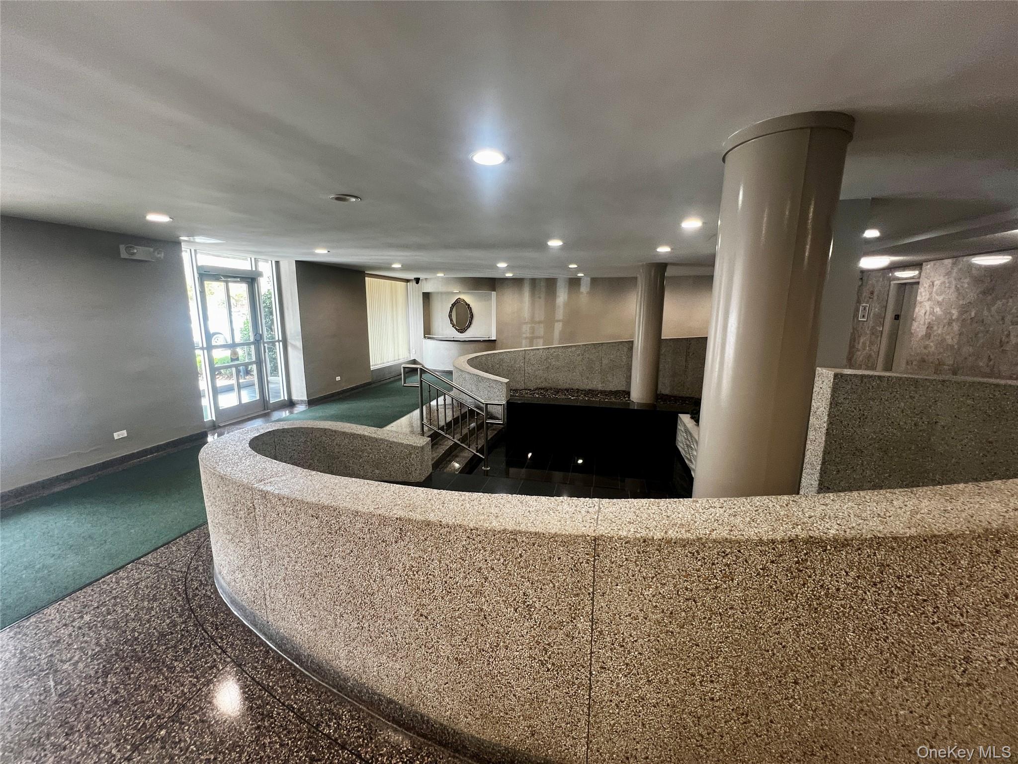 84-29 155th Avenue, Unit 2H Queens, NY 11414 - Photo 33 of 38 Reception area featuring recessed lighting