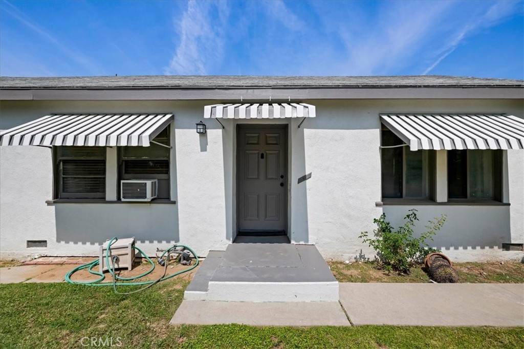 5305 Palm Avenue Riverside, CA 92506 - Photo 8 of 55 a front view of a house with a yard